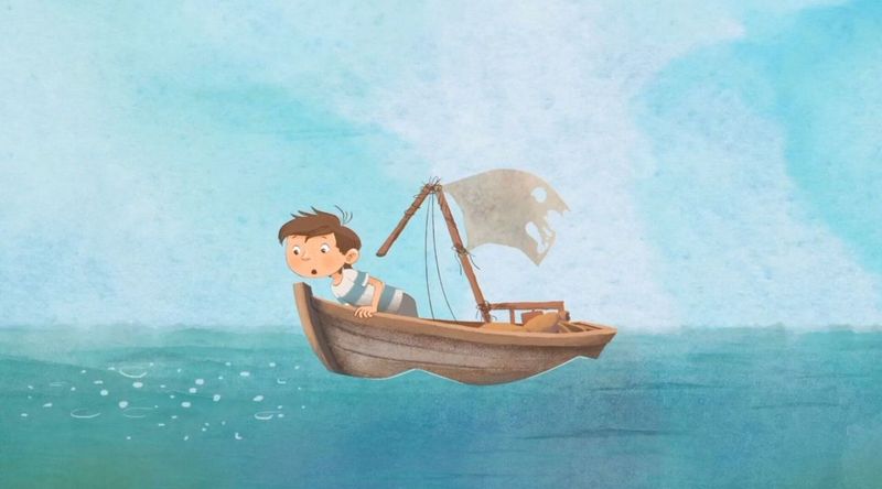 Cena da animação Juzé, que mostra um menino navegando em um pequeno barco.