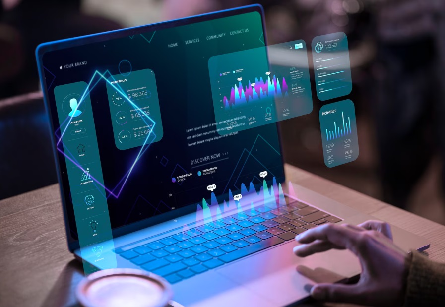 Imagem de um notebook de onde saem imagens de gráficos da tela