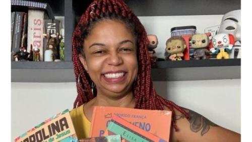 Foto da profesora Luizane Guedes sorrindo