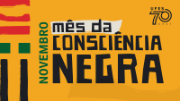 Cartaz amarelo com os dizeres "novembro mês da Consciência Negra". Na borda esquerda, grafismos nas cores preta, verde e vermelho