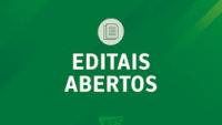 Cartaz com a inscrição "editais abertos"